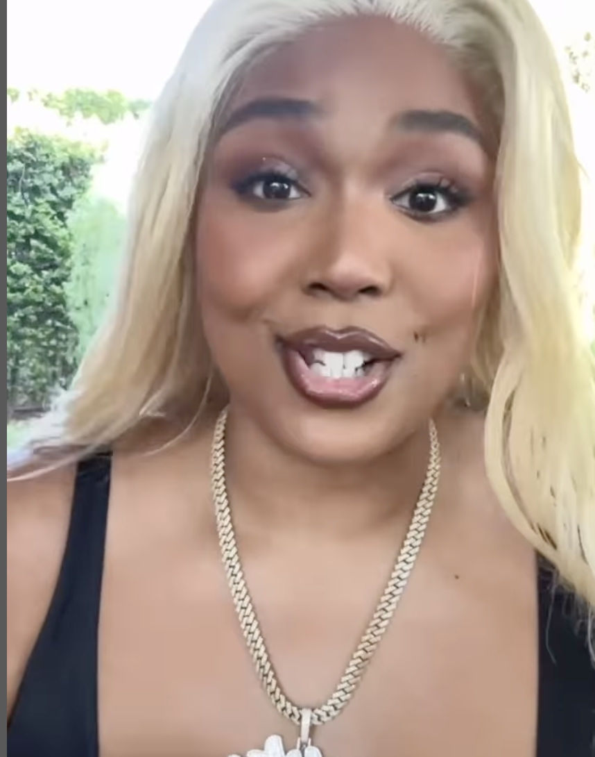 Lizzo Recreates Pamela Anderson’s Iconic Red Swimsuit Picture